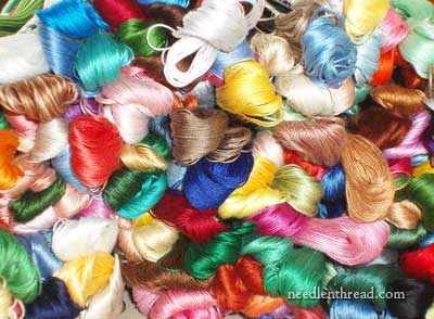 DMC embroidery thread floss, size 5, color 550 (2) 310 (3) 632(1) 919(1)  726 (1)